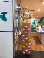 Column with a Large Confetti on Top $150